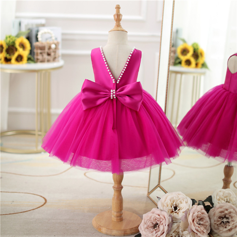 Vestido de fiesta infantil con lazo rosa 