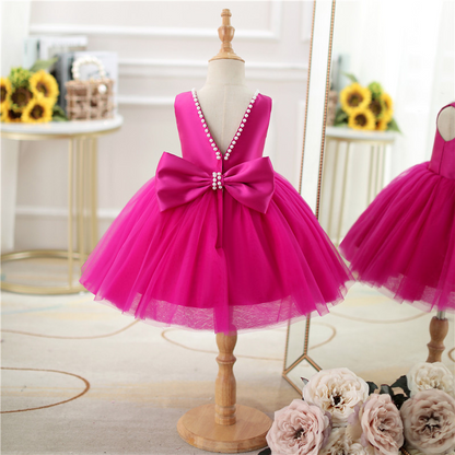 Vestido de fiesta infantil con lazo rosa 