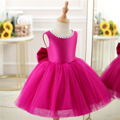 Vestido de fiesta infantil con lazo rosa 