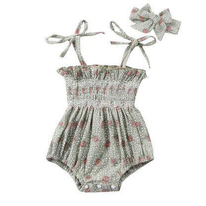 Body infantil con flores y fajín