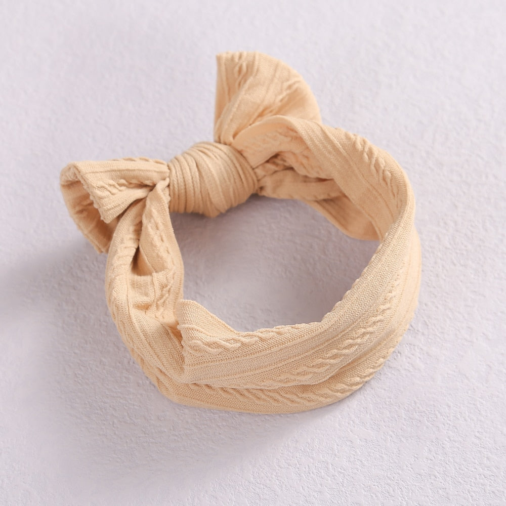 Diadema de bebé con lazo de cable