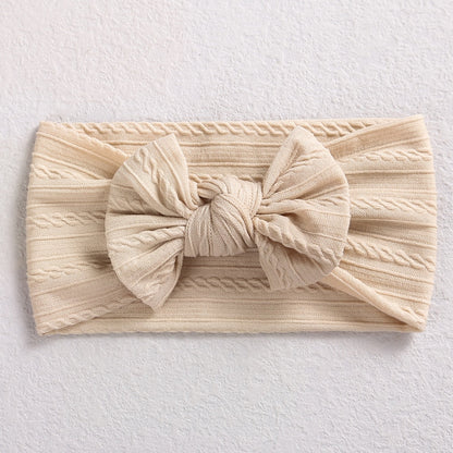 Diadema de bebé con lazo de cable
