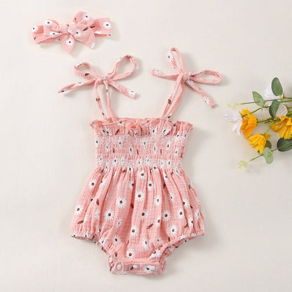 Body infantil con flores y fajín