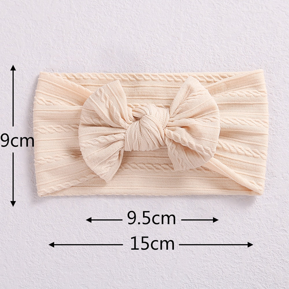 Diadema de bebé con lazo de cable