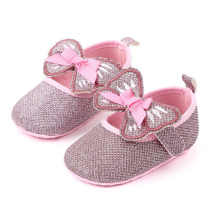 Zapatos planos con lazo de mariposa