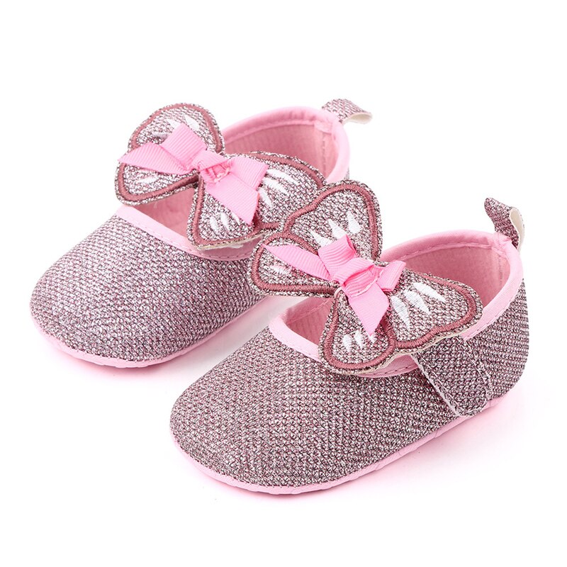 Zapatos planos con lazo de mariposa