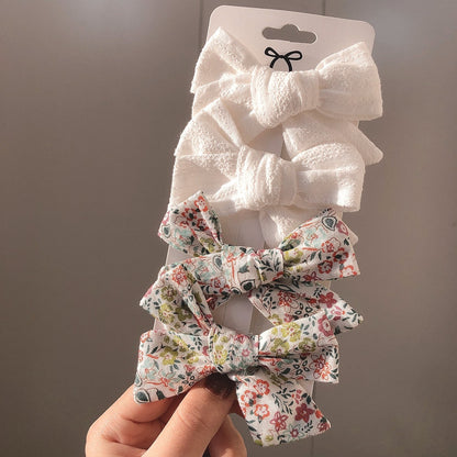 Juego de 4 pinzas para el pelo con lazo bordado de lirios