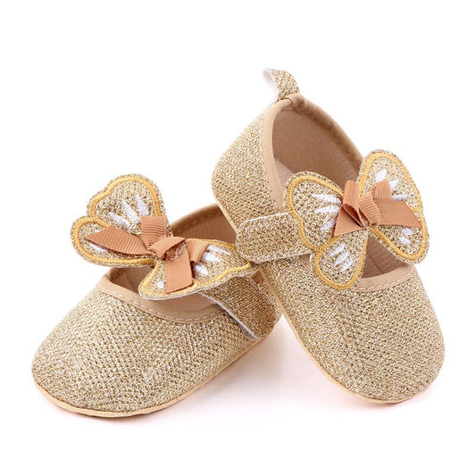 Zapatos planos con lazo de mariposa