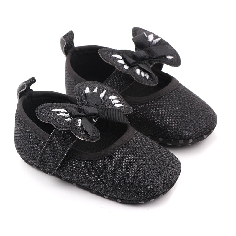 Zapatos planos con lazo de mariposa