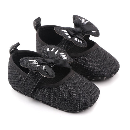 Zapatos planos con lazo de mariposa