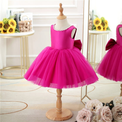 Vestido de fiesta infantil con lazo rosa 