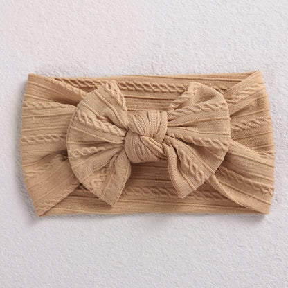Diadema de bebé con lazo de cable