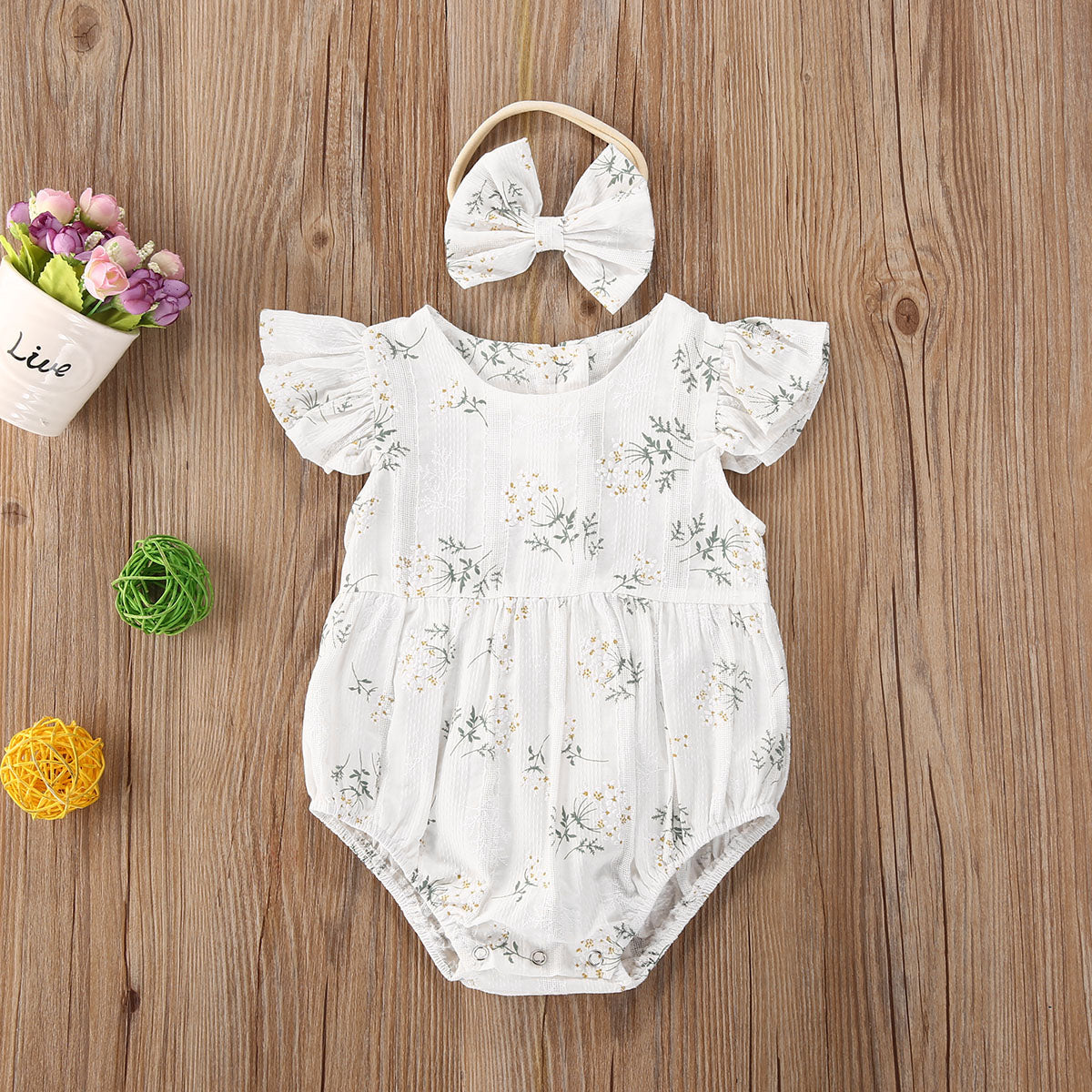 Body de bebé con flores + diadema