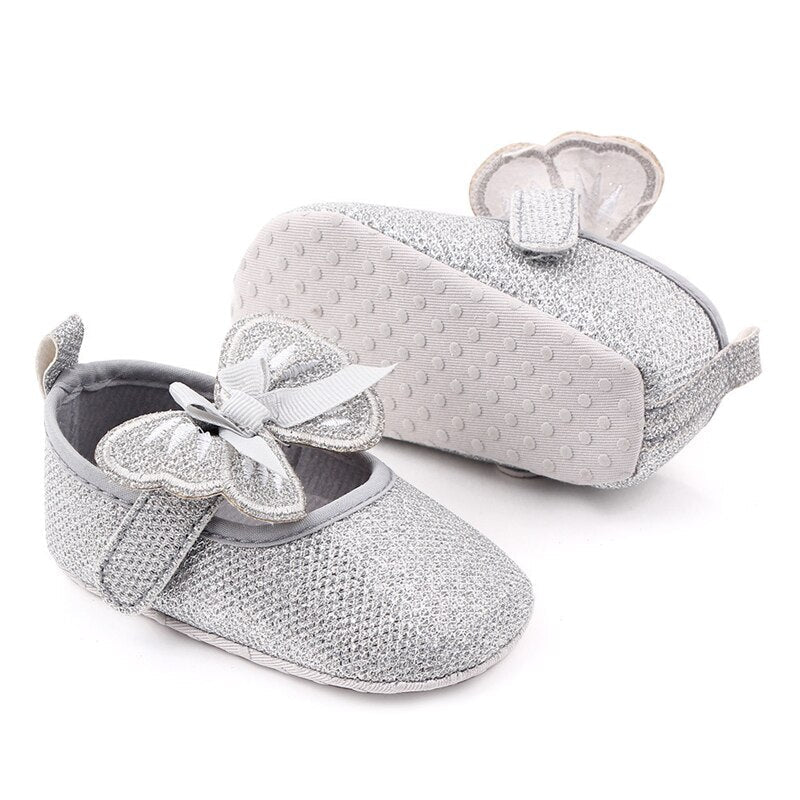 Zapatos planos con lazo de mariposa