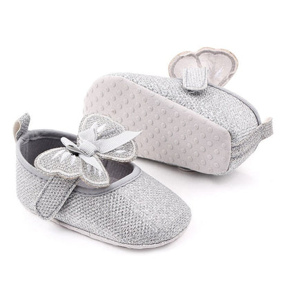 Zapatos planos con lazo de mariposa