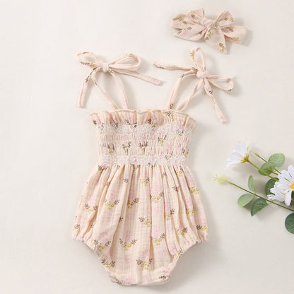 Body infantil con flores y fajín