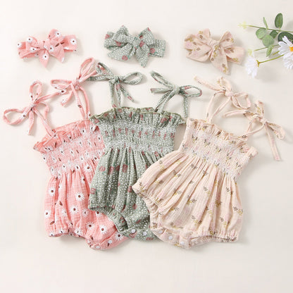 Body infantil con flores y fajín
