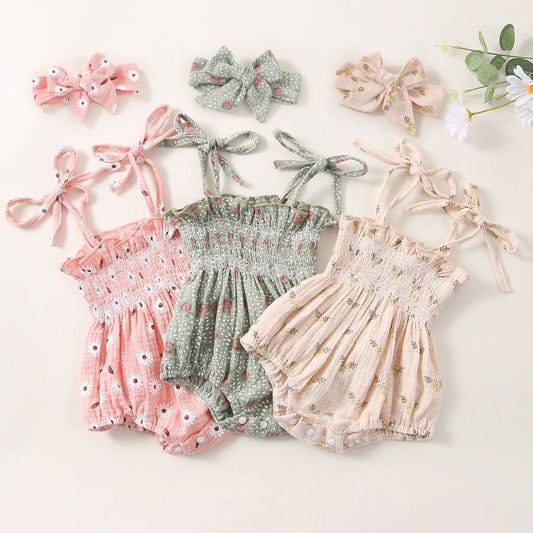 Body infantil con flores y fajín