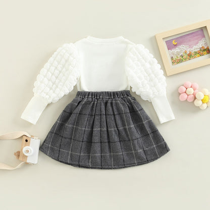 Conjunto infantil blusa manga larga abullonada + falda plisada con botones 