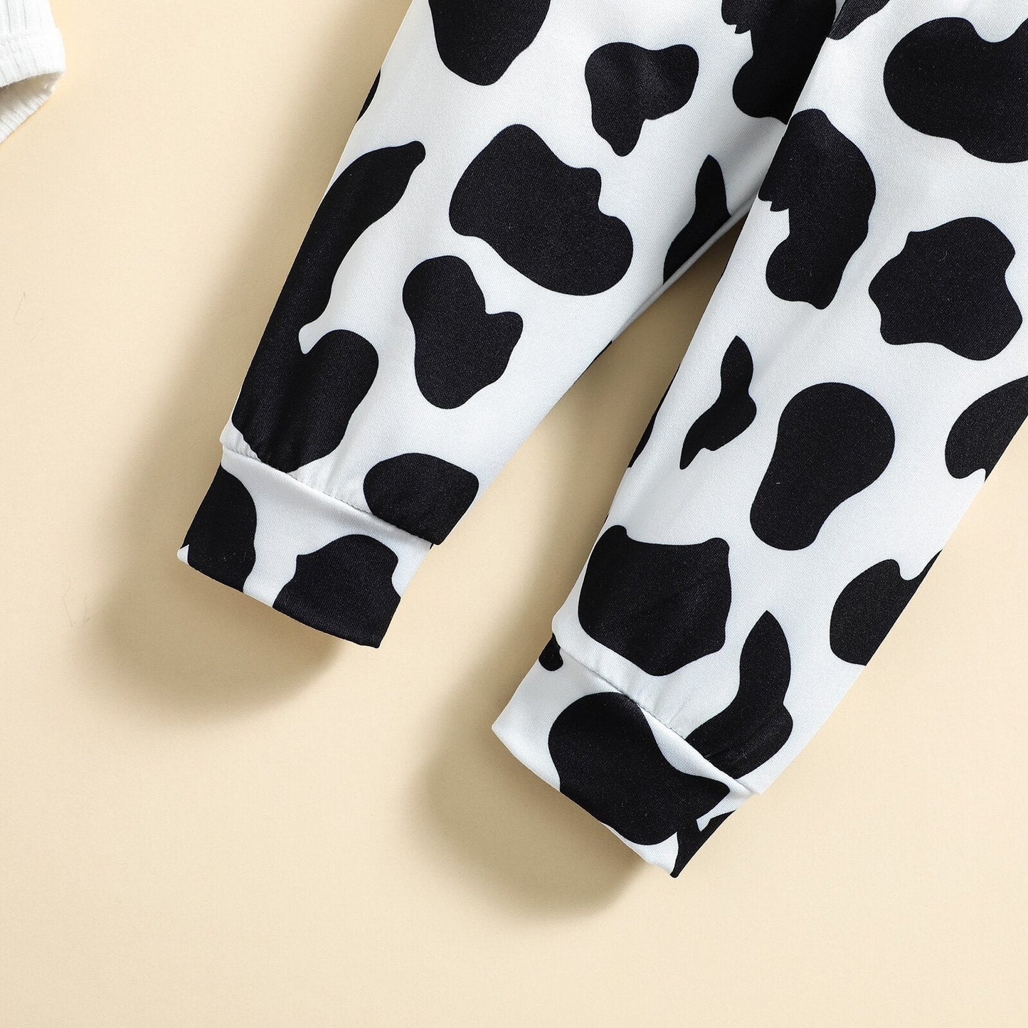 Conjunto de 2 piezas de mameluco + pantalón con estampado de vaca