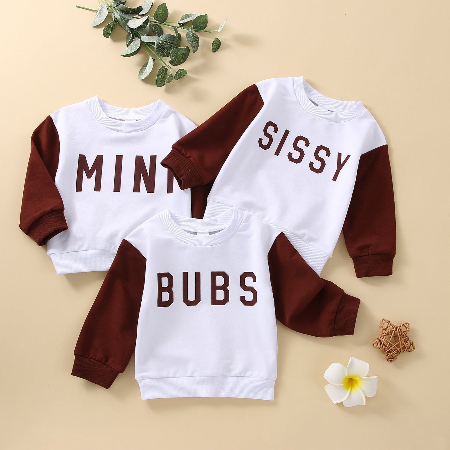 Sudadera infantil marrón y blanca
