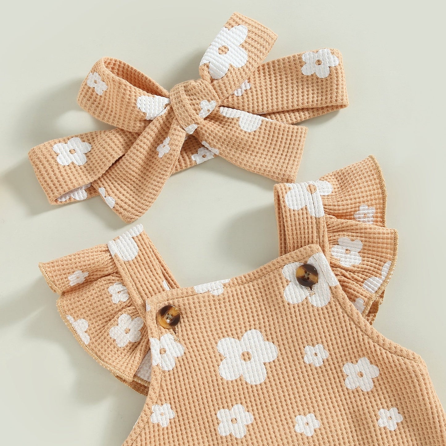 Mono informal con estampado floral, mangas con volantes y diadema