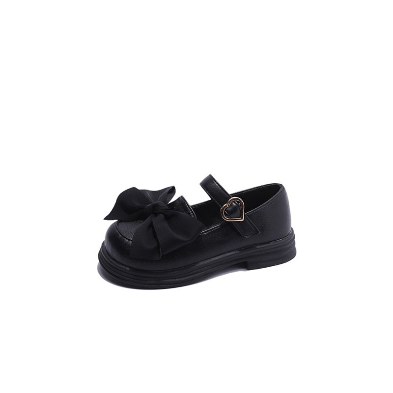 Zapatos de pajarita con cierre de corazón 