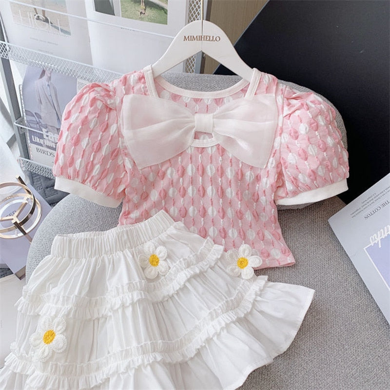 Conjunto infantil de lazo y flores