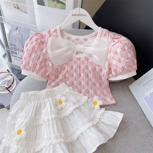 Conjunto infantil de lazo y flores