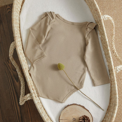 Body infantil con cuello con volantes