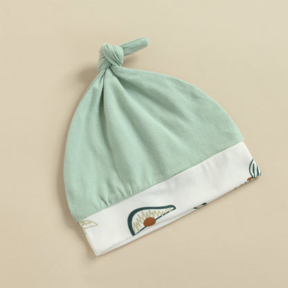 Mono de aguacate con gorra 