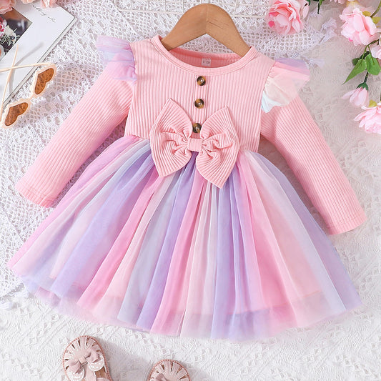 Vestido infantil con lazo y falda colorida