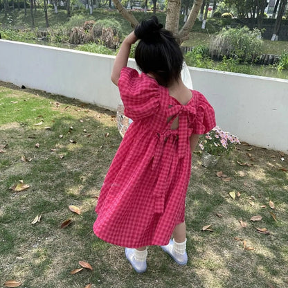 Vestido elegante con lazo