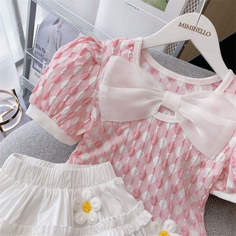 Conjunto infantil de lazo y flores