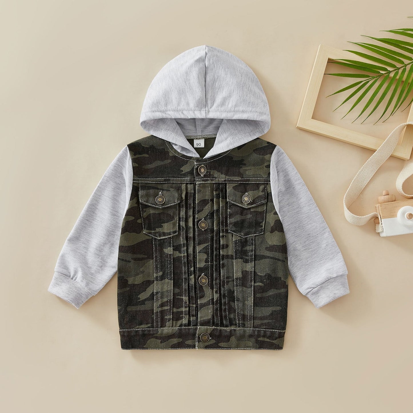 Botones de blusa infantil con capucha
